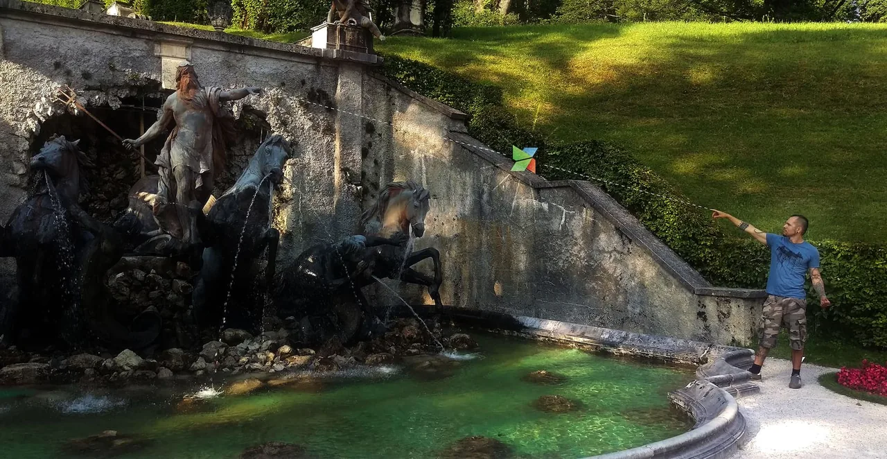 Yanni Sanmiguel next to the Poseidon fountain